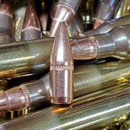 .223 Remington 55 grain BTHP @ 2,950 FPS.